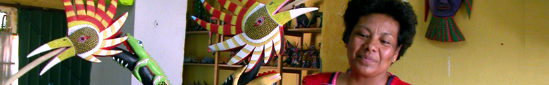 Local artist creating alebrijes -folk art sculpture of imaginary animal