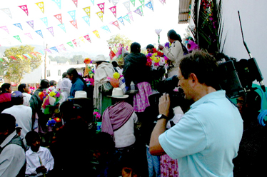 Patrick filming the Village Celebration