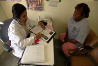 Dr. Mendoza talking to her patient