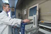 Professor Peter Wipf in research lab in front of monitor