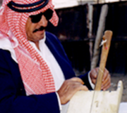 Image of Jordanian singer playing the traditional instrument 
