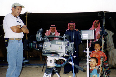 Outtake of film crew and camera equipment and host family