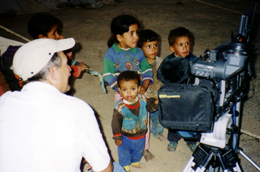 Outtake of film crew and equipment with Bedouin Children