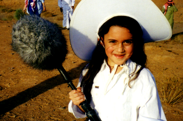 Local girl holding the mic for fun